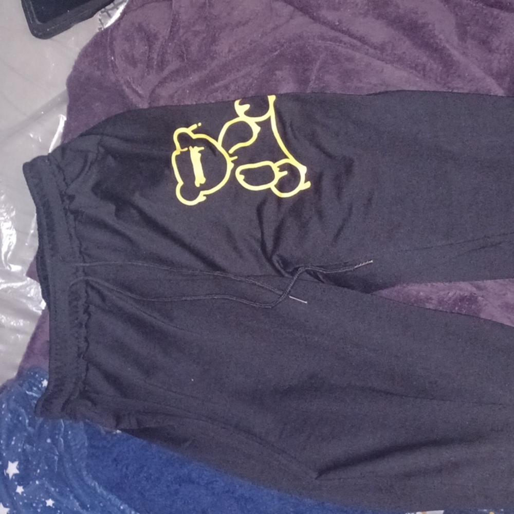 Track pants / size 6m / black with a gold besr outline on the left pants leg